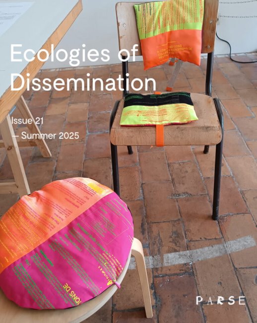 A stool and a chair, with colourful cushions attached to them, next to a table on a brick floor. Each cushion is screen-printed with text fragments.
